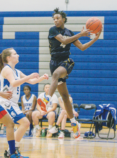  Fitzgerald sophomore Kaylynn Millander grabs a rebound during a game against Warren Woods-Tower on Jan. 13. 