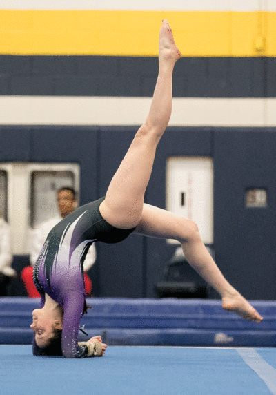  Bloomfield Hills freshman Lainey Socha performs her floor routine at the Fraser Invitational Jan. 7 at Fraser High School.  