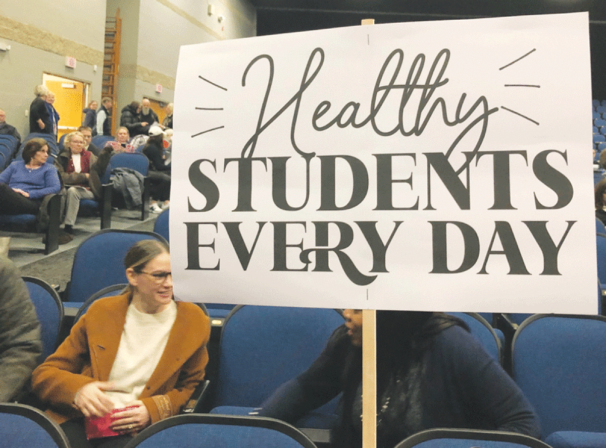  Supporters of a student health clinic at Grosse Pointe North High School brought signs to display during a special Grosse Pointe Board of Education meeting Jan. 19 at Brownell Middle School in Grosse Pointe Farms. 