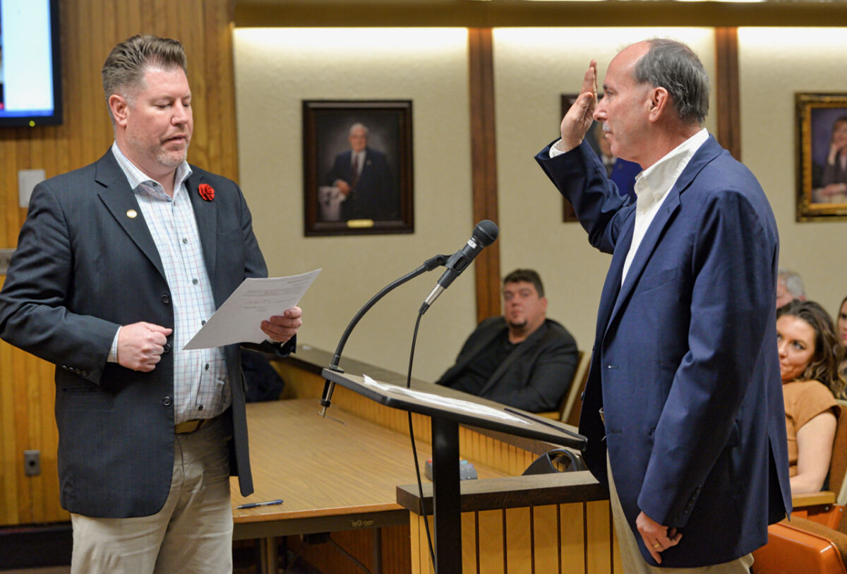  Clawson City Clerk August Gitschlag swears in Scott Tinlin as a City Council member. After having a seat vacant for more than a year, the council appointed Tinlin during its Jan. 17 meeting. 