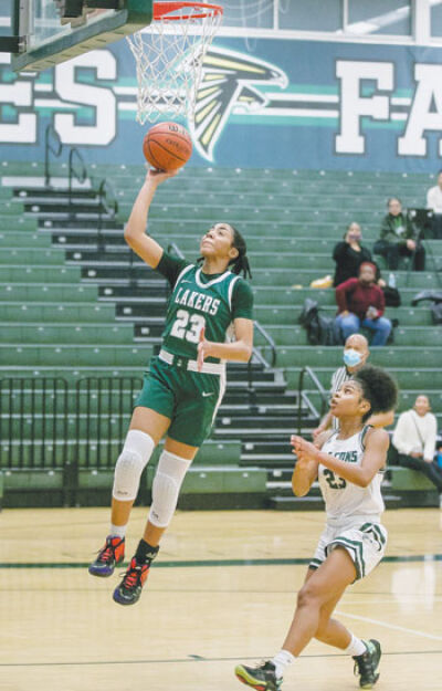  West Bloomfield junior Summer Davis drives for a layup against Groves. 