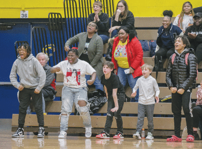  Center Line fans celebrate after a big play against Clinton Township Clintondale on Feb. 1 at Clintondale High School. 