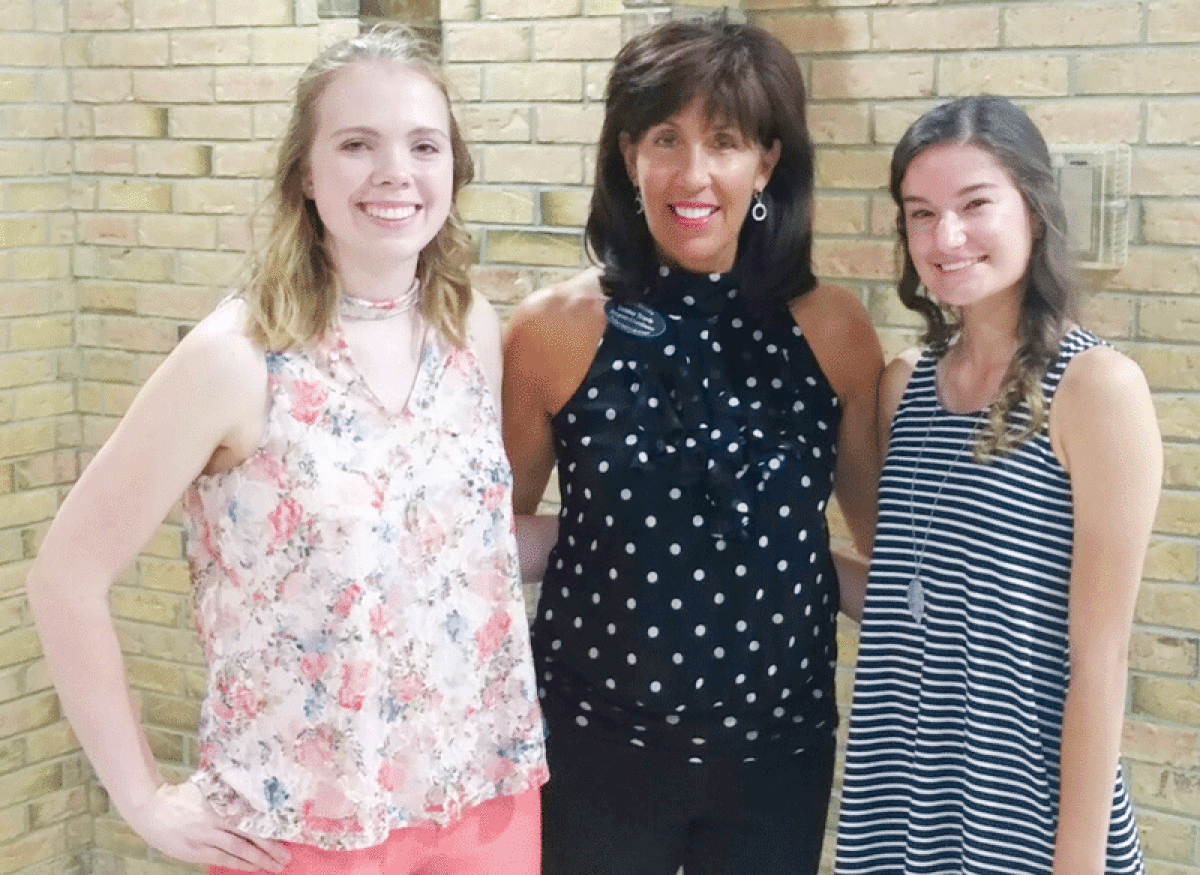  Pictured left to right, Kaitlyn Prewitt, Debbie Travis and Katelyn Burch. Prewitt and Burch are previous recipients of the Friends of the Clinton Township Senior Center College Scholarship Fund.  