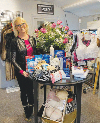  Lisa Dunn is a Franklin resident and the owner of Déjà Vu Upscale Designer Resale in Franklin. She displayed donations for the Shop Your Heart Out Event 2021.  