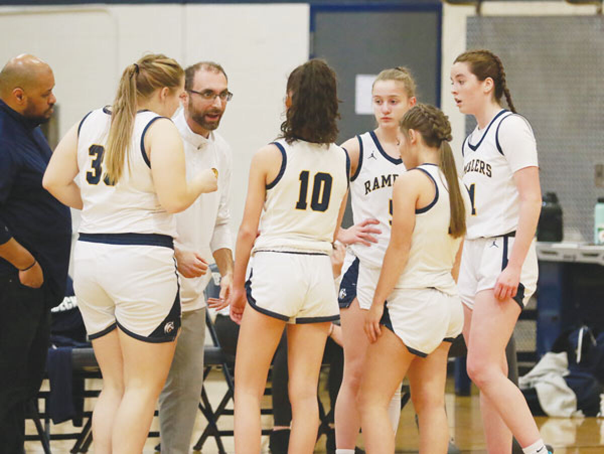  Fraser head coach Rob Fulgenzi holds a conversation with his team in their game against St. Clair on Jan. 31 at Fraser High School. 