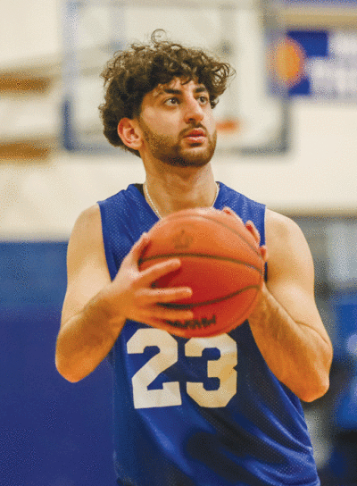  Madison Heights Lamphere senior Dayvid Al Sabbagh takes a shot during Lamphere’s practice on Feb. 15. 