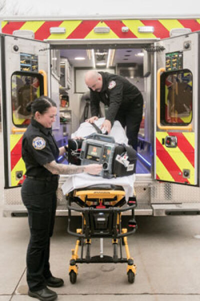  Roseville firefighter-paramedics Danielle Doering and Paul Kutzura give a demonstration with the new ambulance equipment. 