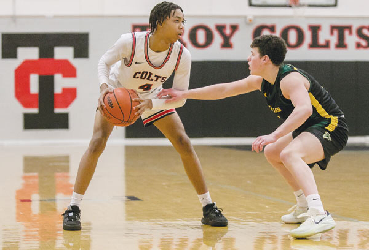  Troy sophomore guard Andrew Lake controls the ball against Birmingham Groves Jan. 31 at Troy High School. 