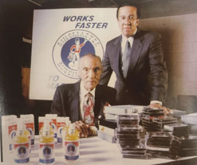  Frank B. Sewell and his son, Douglas Sewell, pose with the product and testimonial tapes. 