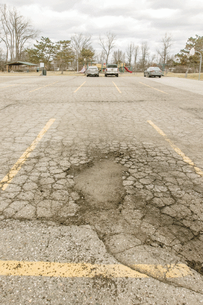  One of the parking lots at Joy Road Park in Clinton Township. The Board of Trustees approved a request by the township’s Department of Public Services to pursue a SEMCOG Green Stormwater Infrastructure Grant to help build new parking lots.  