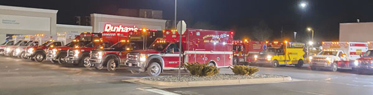 Multiple emergency responders, including two firefighters/paramedics from the West Bloomfield Fire Department, went to East Lansing following the mass shooting on the campus of Michigan State University Feb. 13. Pictured is a staging area located approximately 2 miles from the incident. 
