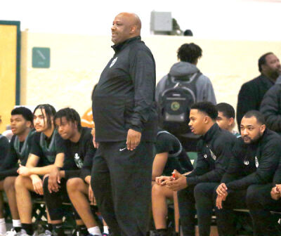  West Bloomfield coach Arnette Jordan looks on during West Bloomfield’s game against Birmingham Groves. 