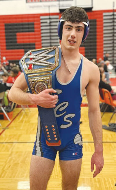  Lakeview senior Dylan Castle shows off the blue WWE belt after a hard-fought win over St. Clair Shores Lake Shore. 