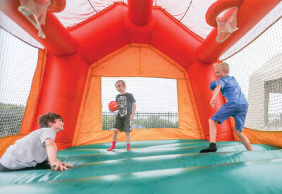  The bounce houses at Oakland County FC home games at Royal Oak High School were a big hit with families last year. 