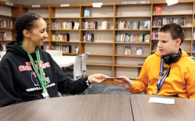  Roseville Middle School sixth grader Aiden Heath, right, was touched by Adrienne Miller’s kind words. Miller is a restorative justice facilitator. 