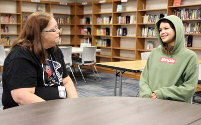  Roseville Middle School interventionist Madonna Voyles, left, has a conversation with sixth grader Adrianna Flores. Voyles chose Flores as her “Be The Reason” student. 