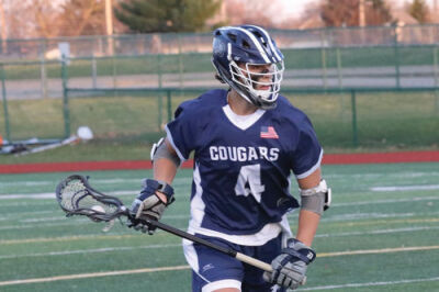  Junior Aiden Criteser controls the ball for Macomb Dakota. 