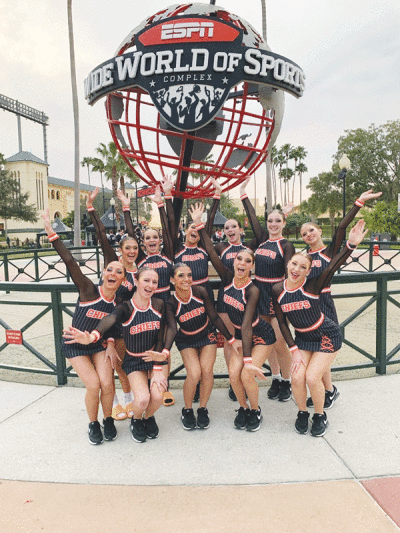  Utica dance, which competed at the Universal Dance Association National Dance Team Championship Feb. 3-5 at the ESPN Center in Orlando, Florida, poses for a photo with the ESPN Center’s sign. 