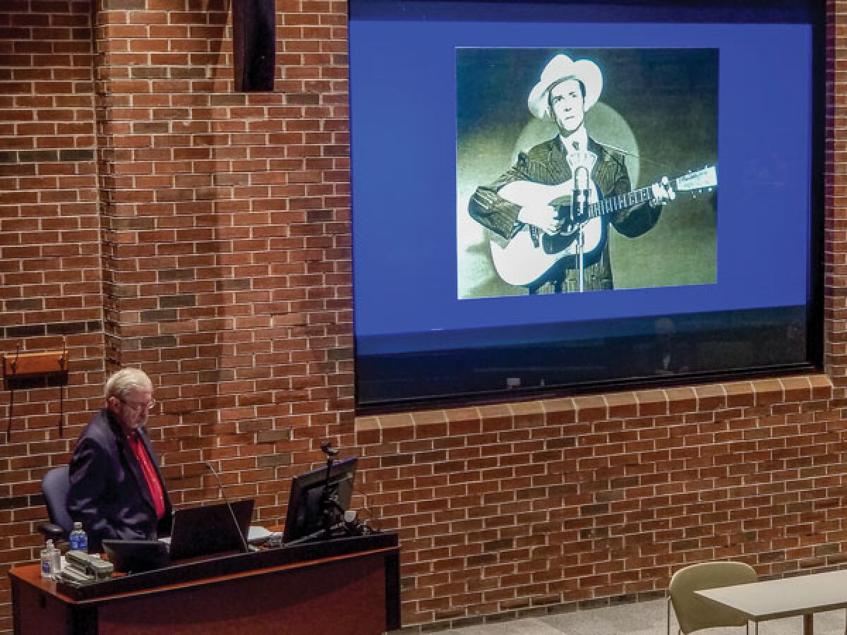  With a photo of the late Hank Williams Sr., Stu Johnson presents “Music of the Postwar Years: 1946 to 1955” May 17 at Assembly Hall at Macomb Community College’s University Center in Clinton Township. 