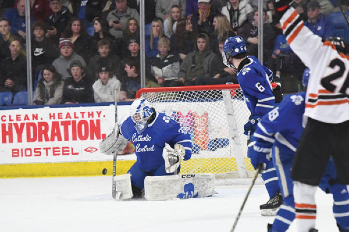  Detroit Catholic Central senior goaltender Luca Naurato makes a stop against Brighton during the Michigan High School Athletic Association Division 1 State Final March 11 at the USA Hockey Arena in Plymouth. 
