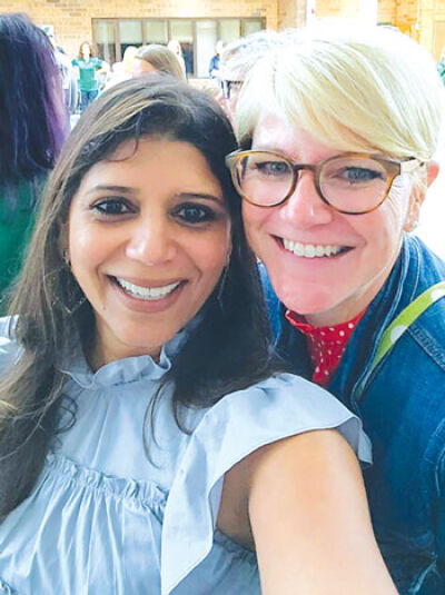  Novi Community School District social worker and adult transition coordinator Kristin Corrion poses for a photograph with Shailee Patel, the district’s director of special education. 