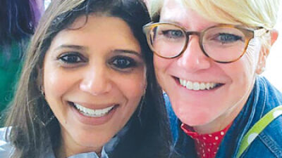  Novi Community School District social worker and adult transition coordinator Kristin Corrion poses for a photograph with Shailee Patel, the district’s director of special education. 