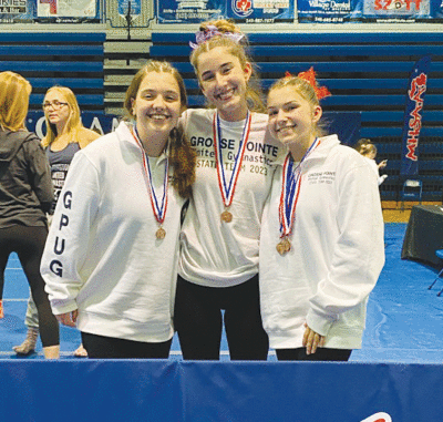  Grosse Pointe United had three gymnasts earn all-state honors at the state finals. They are, from left, seniors Maddie LoPorto, Madi Lucido and Ava Rogowski. 