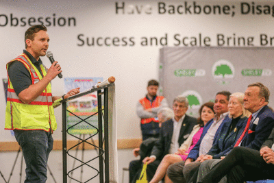  Todd McCarthy, site lead for the Amazon facility in Shelby Township, welcomes the attendees of the State of the Township address to the fulfilment facility March 24. 