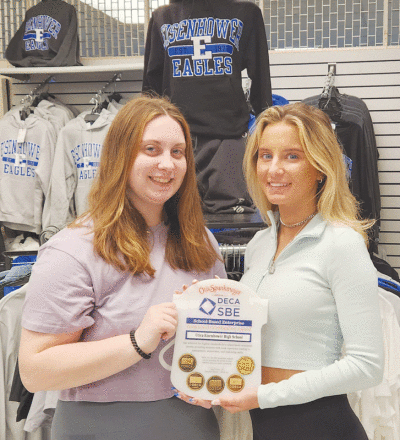  Students Rachael Gaulin and Alyssa Kassab helped Eisenhower High School’s store, The Eagles Nest, earn gold certification from DECA.  