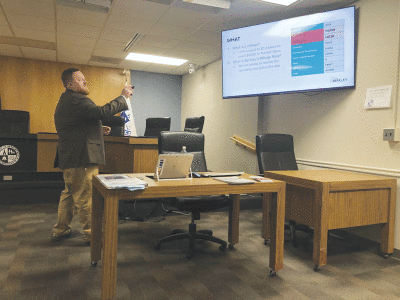  Berkley City Manager Matt Baumgarten reviews the details of a millage proposal for a Headlee override with residents at an informational meeting April 12 at City Hall. 