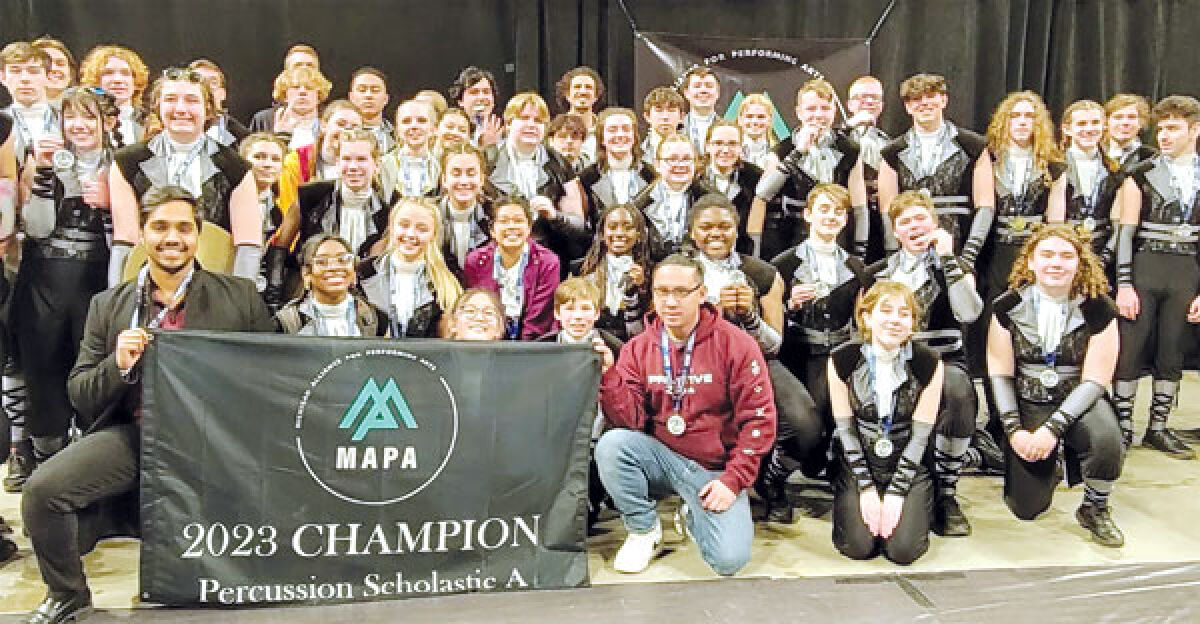  The Dakota High School drumline poses for a photo after winning the Michigan Alliance for the Performing Arts (MAPA) Scholastic A drumline championship on April 2 at Eastern Michigan University. 