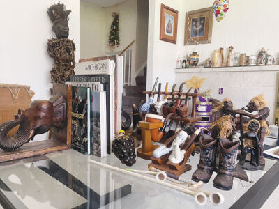  Purifoy-Seldon’s living room is home to her late husband’s collection of artifacts from all over the world. 