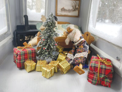  Aside from two dolls, there have been a dog, a wood-burning stove and a Christmas tree with presents underneath it placed in the mailbox of Orchard Lake resident Don R. Powell. 