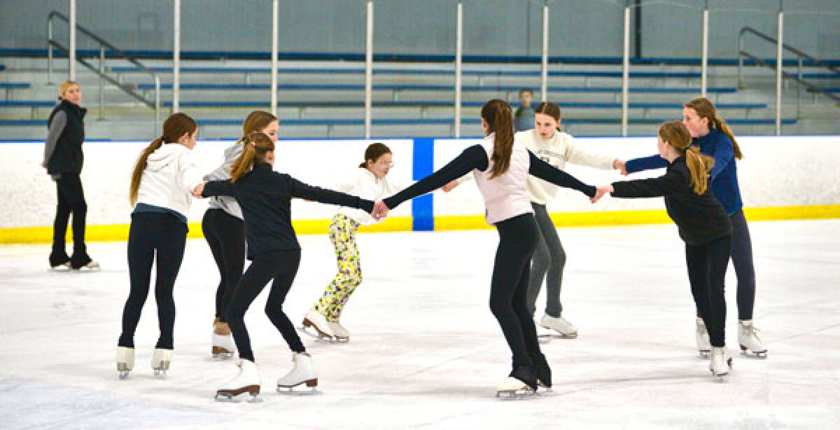  Performers in the Royal Oak Ice Show, which will take place May 6-7, skate during one of their rehearsals. 