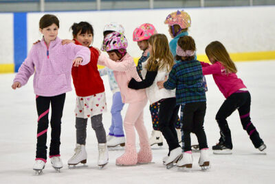  A group of kids work together during a rehearsal April 21 for the annual Royal Oak Ice Show. 