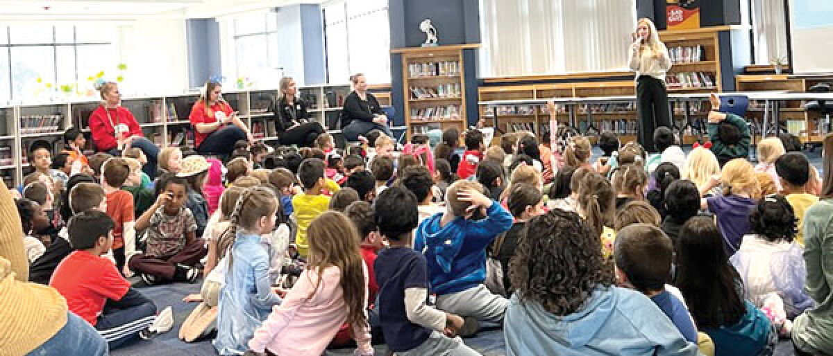  Caroline Kerfoot, of West Bloomfield, a children’s author and illustrator, spoke to more than 400 students during multiple presentations at Orchard Hills Elementary School in Novi March 25. 