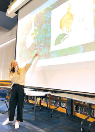  Caroline Kerfoot presents her book, “Hi, I’m Fox!,” to students at Orchard Hills Elementary School in Novi March 25. 