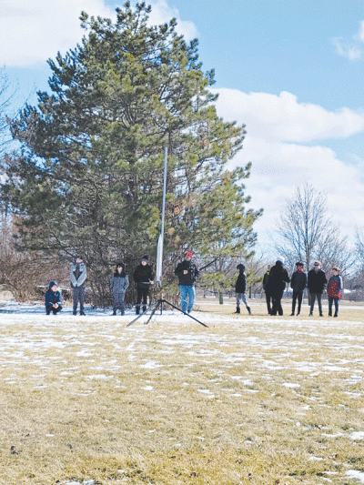  Shelby Junior High School students  prepare to launch their rocket. 