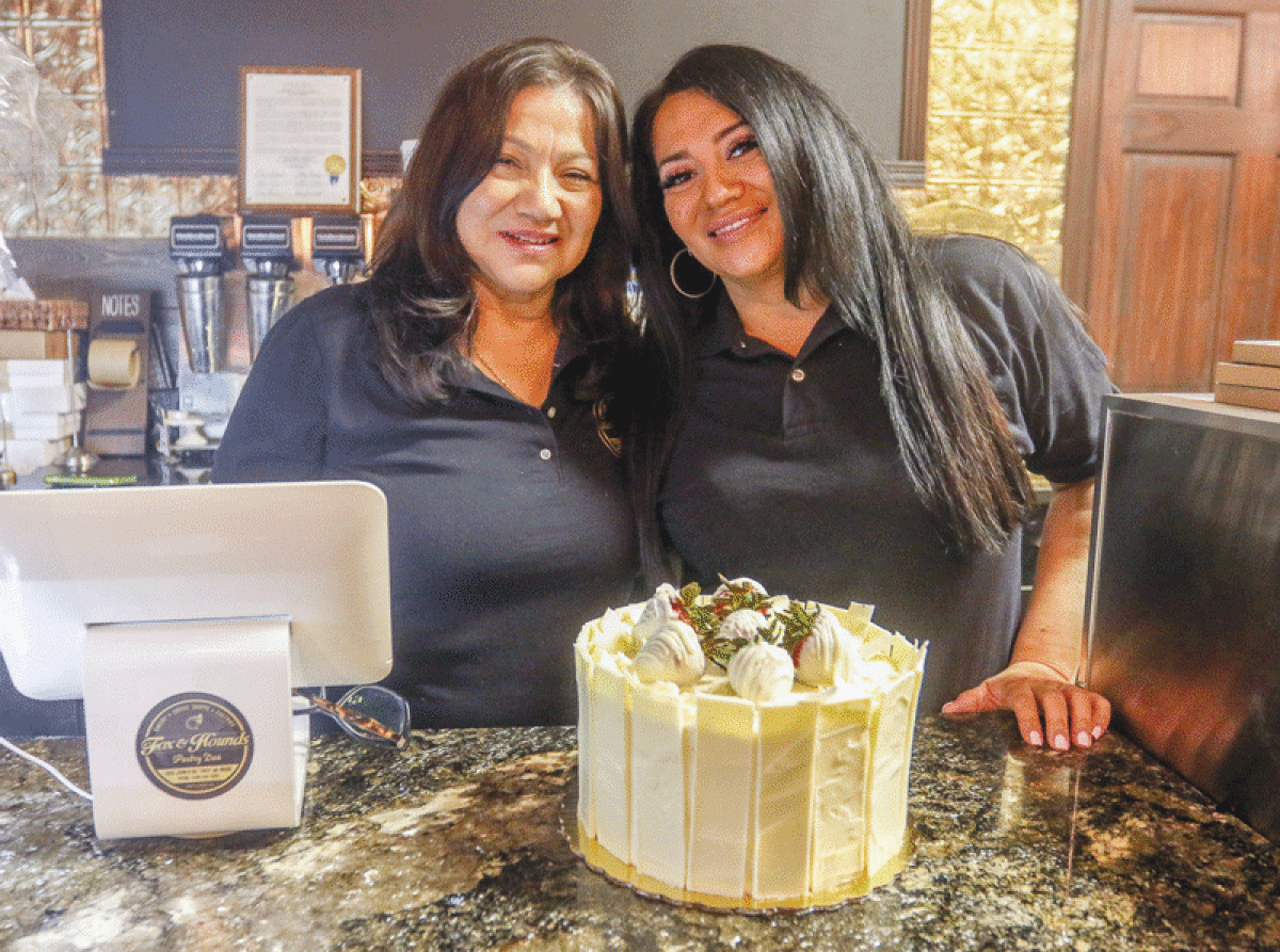  Monica Nacianceno, left, and her daughter Monica Guzman, right, opened Fox and Hounds Pastry Den in 2016 and have been serving the Troy community with a smile since. 