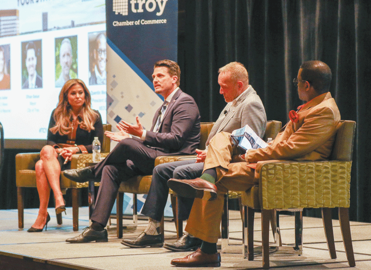  Fox 2 Anchor Taryn Asher moderated a panel discussion with Troy Mayor Ethan Baker, Oakland County Executive Dave Coulter and MEDC President and CEO Quentin Messer Jr. on the state of business in Troy and Oakland County. 