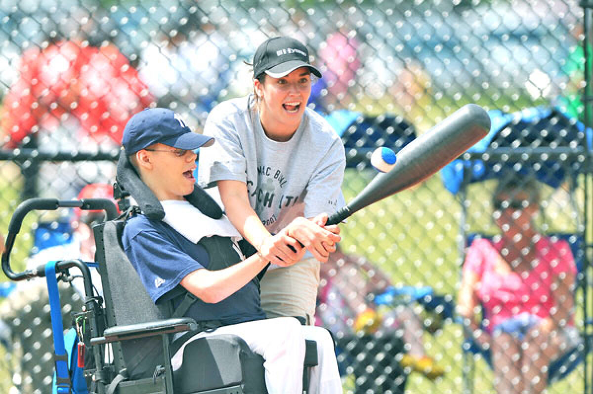  Stephen Peck, the founder and director of the Easterseals Miracle League of Michigan, said player and buddy become one. 