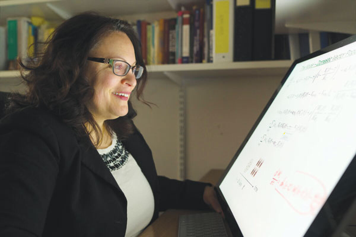  Anna Spagnuolo, Oakland University professor of mathematics and chair of the department of mathematics and statistics, was named as one of three distinguished professors by the Michigan Association of State Universities for 2023.  
