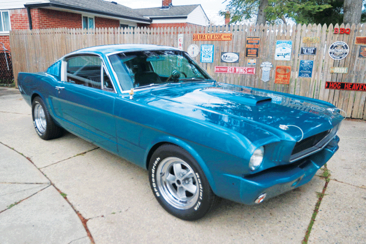   Charles Waggoner bought his 1965 Ford Mustang fastback in 1974 for $175. His daughter, Danielle Watts, is now the owner and is keeping the treasured heirloom in the family. Danielle Watts and her husband, Ron, of Fraser, take the twilight turquoise Mustang to local car shows.  