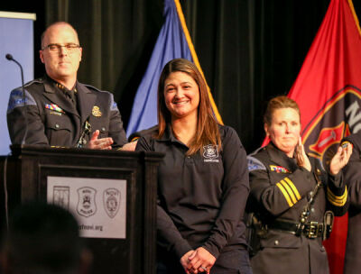  Dispatch shift leader Jenea Sharma receives the Civilian of the Year Award. 