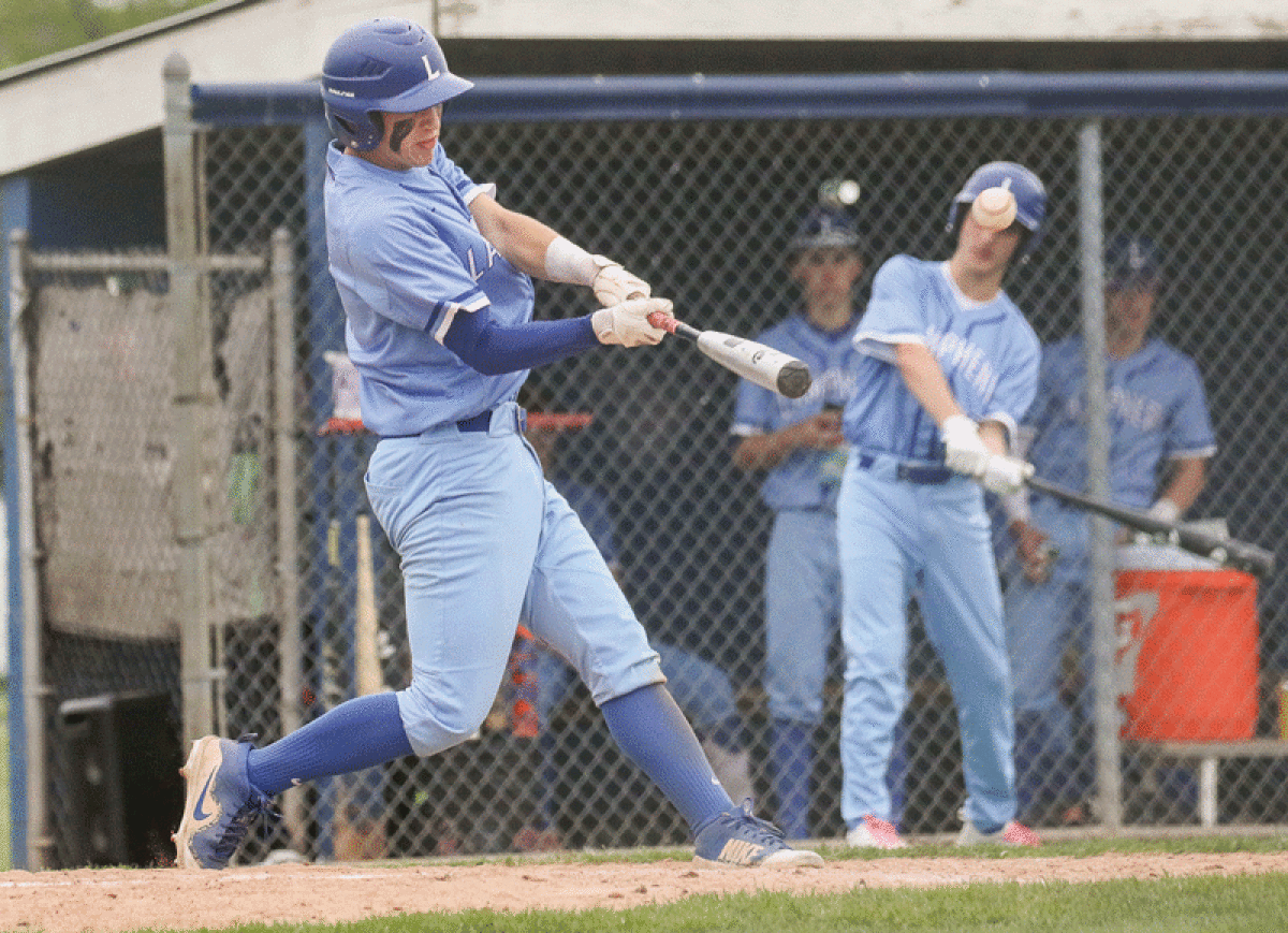  Senior Jamison Ross smacks a home run against Sterling Heights on May 12 at Lamphere High School. 
