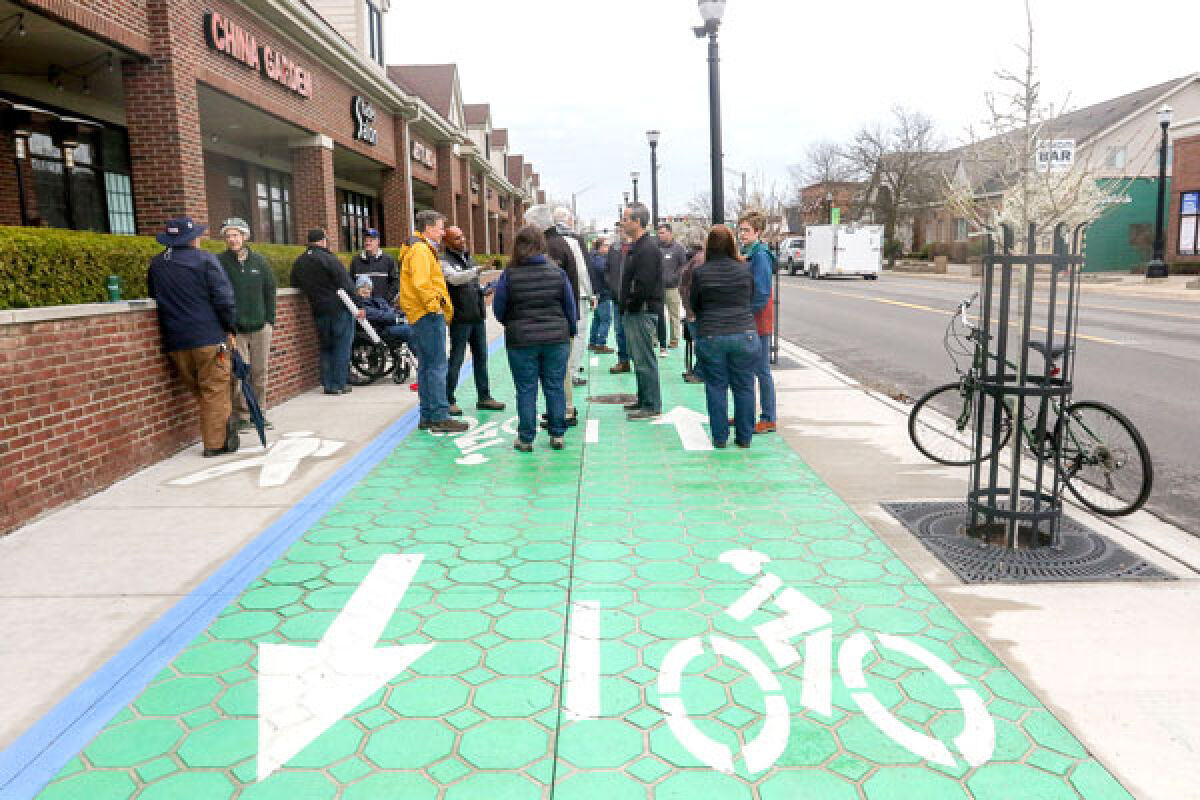  On April 22, a celebration was held in downtown Wixom to recognize the opening of Phase Two of the Michigan Air Line Trail. 