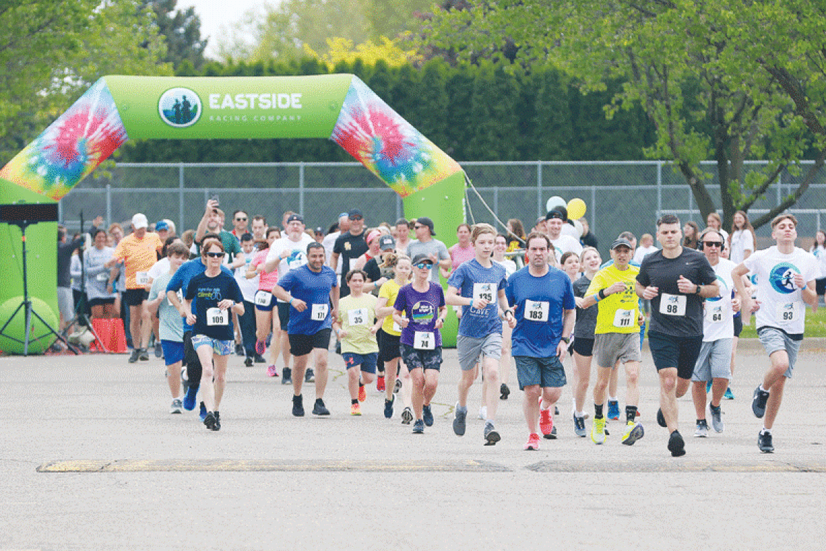  The Philip S. Killoran Chapter of the National Honor Society at Sterling Heights High School held its annual 5K race and family fun run/walk May 13 to benefit Friends of Foster Kids.	 