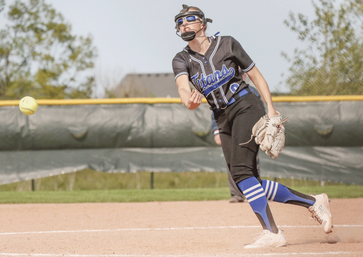  Warren Woods Tower junior captain Lily Thomspon throws a pitch during their May 17 matchup against New Haven. 