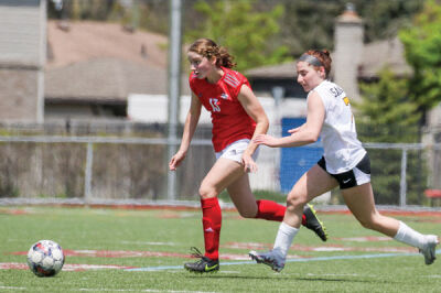  Lake Shore sophomore Megan Morell fights for possession of the ball. 