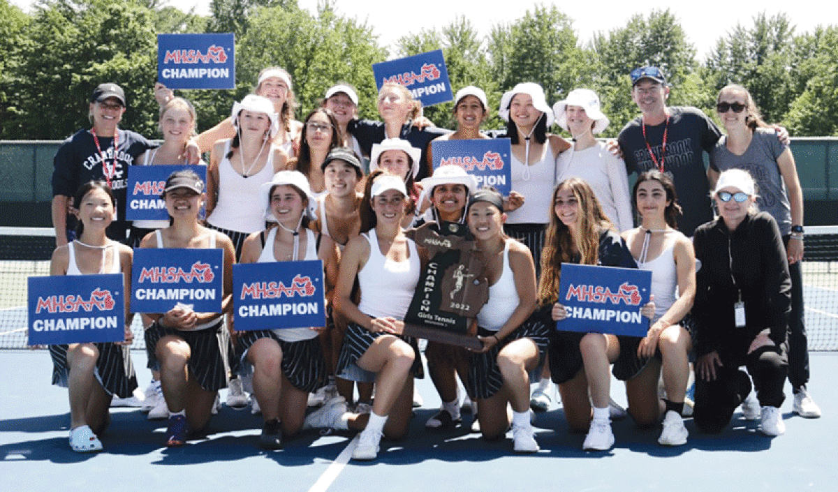  Bloomfield Hills Cranbrook Kingswood celebrates its Division III state tennis title at the Michigan High School Athletics Association State Championship at Midland Tennis Center and Midland High School June 3. 